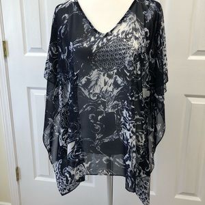 Chico’s navy blue and white tunic.